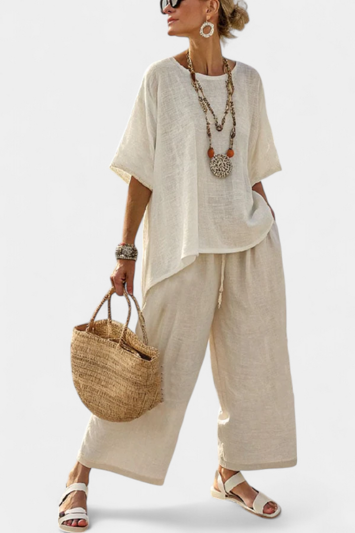 Complete Minimalist Daisy in raw tones with oversized blouse and wide pants for a simple and elegant style