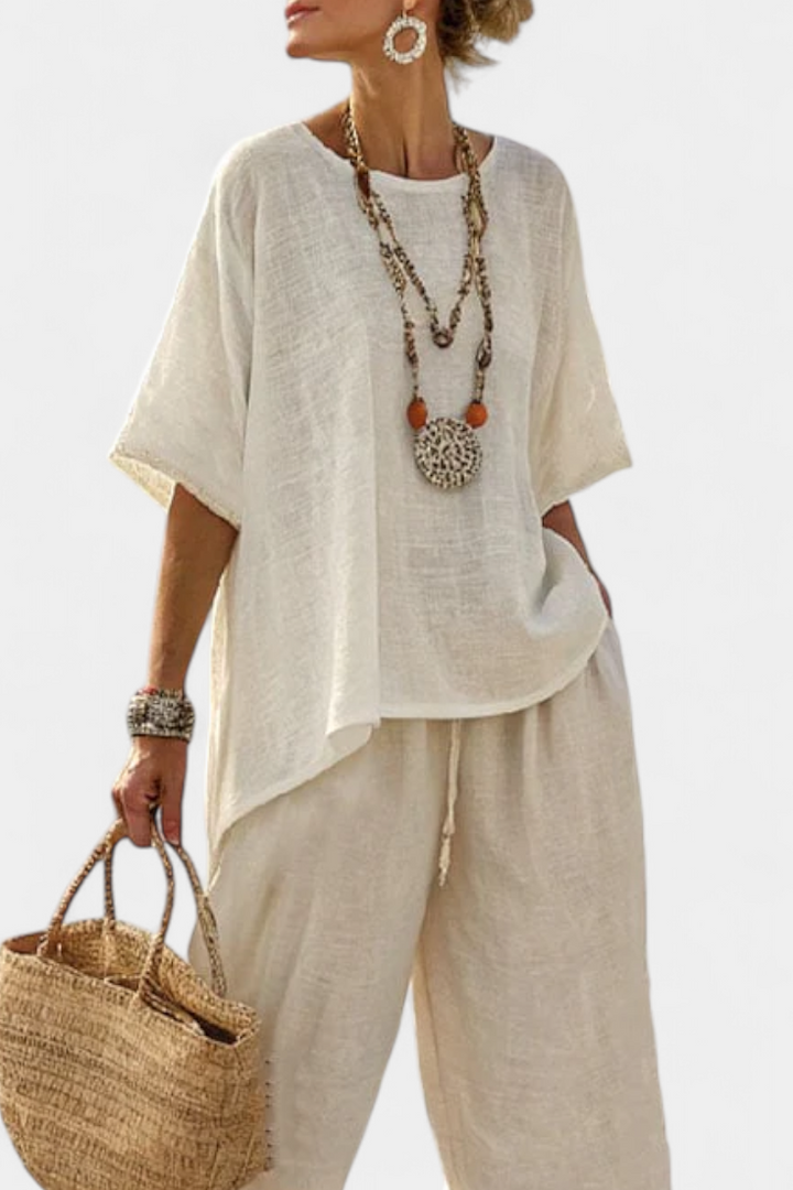 Complete Minimalist Daisy in raw tones with oversized blouse and wide pants for a simple and elegant style
